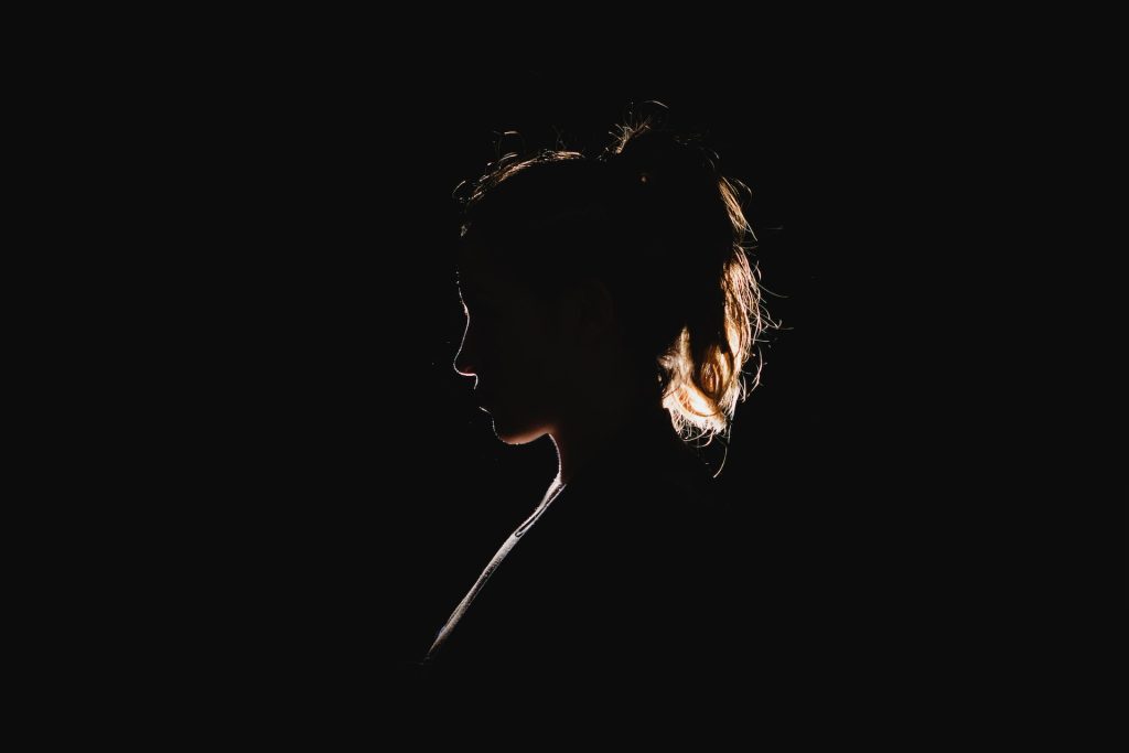 Image shows silhouette of a lady with light shining behind her. This is to illustrate the idea that you need a cover letter to show a different perspective on your experience and expertise.